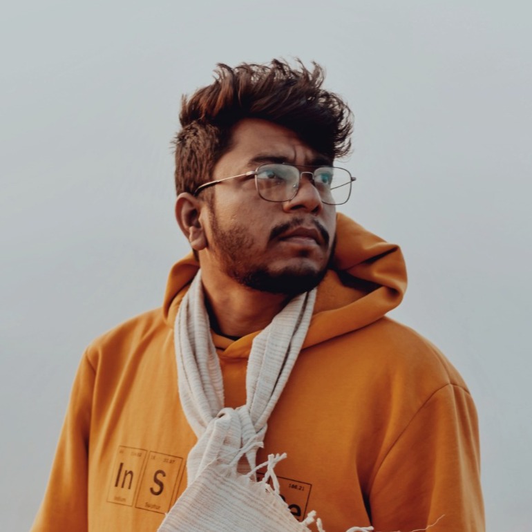 Rajiv Vasava in a mustard jacket
